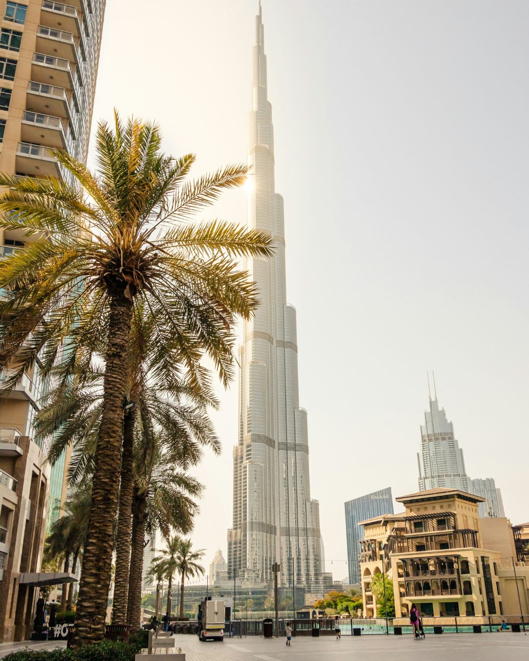 Dubai skyline with Burj Khalifa and palm trees in the modern city center